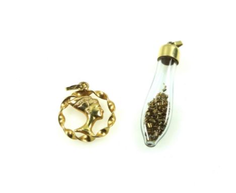 Italian yellow metal openwork pendant with an Egyptian "Cleopatra" within a rope-twist border, marked "750", 2.8grs, and a ye