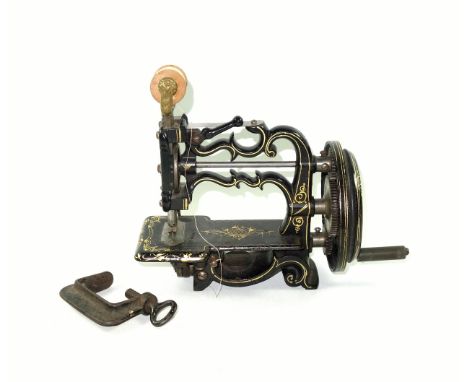 Victorian P. Frank Liverpool small cast iron hand cranked sewing machine, the japanned body with gilt decoration, H.20.5 x W.