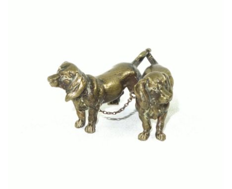 Early 20th Century Austrian finely cast miniature bronze model of 2 dachshunds, standing, and joined at the collar by a leash
