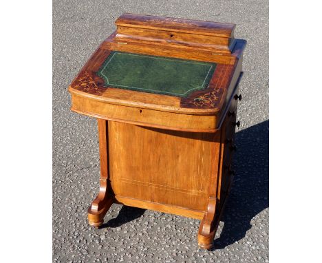 Late Victorian inlaid walnut davenport, the hinged sloping top with inset gilt tooled green leather, and stationary compartme