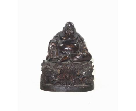 19th Century Chinese bronze figure of Budai finely hollow-cast with a laughing expression, seated in Lalitasana on a lotus th