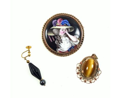 18th century English enamel mounted as a brooch in a gilt metal surround, Dia. 4.4cm, a 'tiger's eye' cabochon set in a gilt 