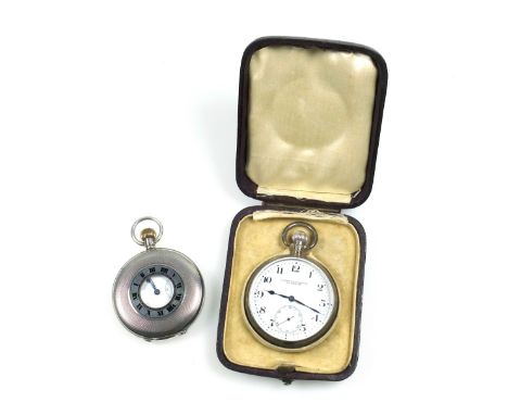 George V Cyma half hunting watch with a circular white enamelled dial black Roman numerals and seconds dial enclosing a Swiss
