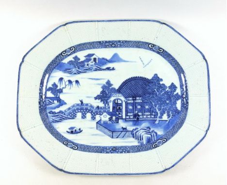 18th Century Chinese export porcelain octagonal meat dish, decorated in underglaze blue with a "Willow" style pattern incorpo