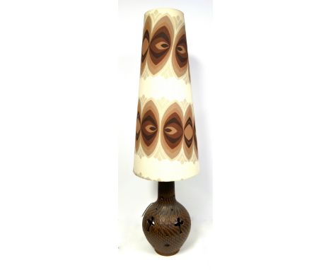 West German floor lamp with original 1970s oversized shade, the ceramic base with dimpled decoration and ecclesiastical looki