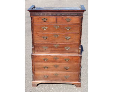 George III mahogany chest on chest with a Greek key and cavetto moulded cornice, the frieze with applied decoration imitating
