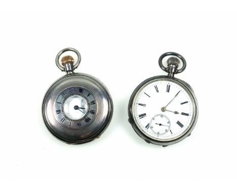 Edwardian half hunting watch with a circular white enamelled dial, black Roman numerals and seconds dial enclosing a Swiss to