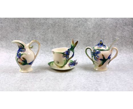Franz porcelain designed by May Wei-Xuet Mei, in Hummingbird design, comprising a cream jug, sucrier with spoon and cover, cu