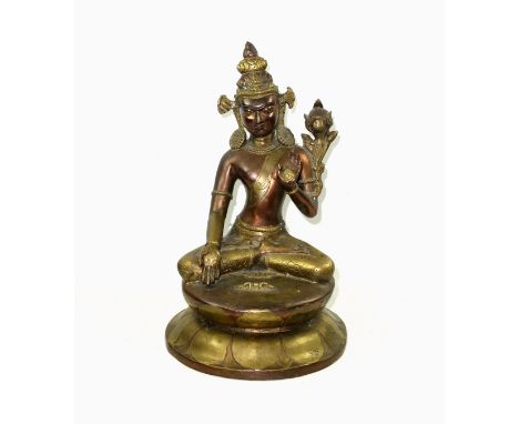 19th Century Tibetan bronze figure of Tara Buddha, seated in Vajrasana on a double lotus base, her right hand in Varada mudra