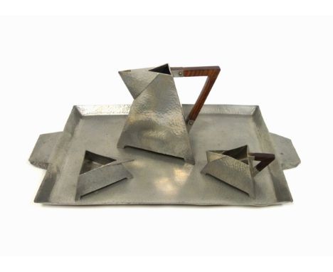 Arts and Crafts hammered pewter 4 piece coffee set, comprising coffee pot, (cover missing); sugar bowl, jug, and tray, W49cm,
