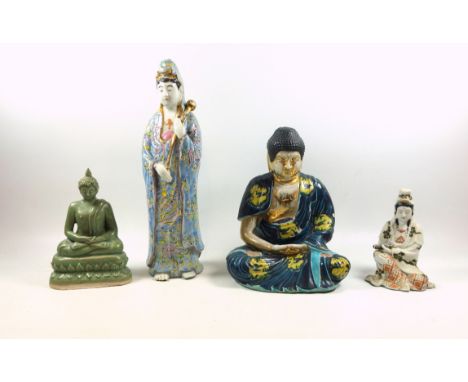 Early 20th Century Chinese porcelain figure of a female deity, holding a gilt staff, in a pale blue robe with polychrome and 