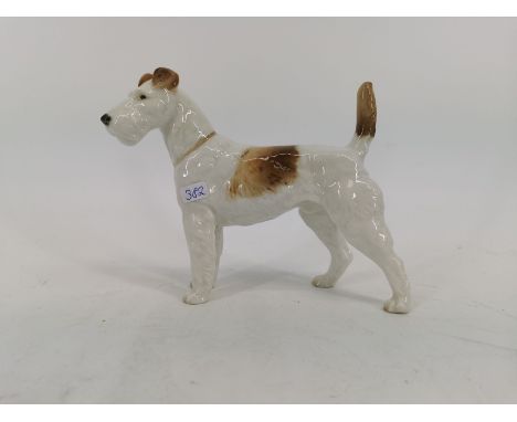 PORZELLANFIGUR: "Terrier", wohl Manufaktur Goebel, Rödental. Stehender Hund in naturalistischer Darstellung und mit partielle
