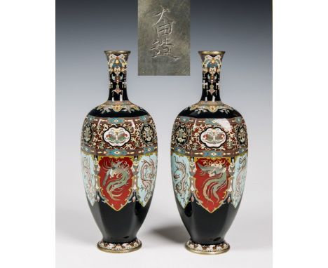 A pair of midnight blue ground Japanese cloisonn&eacute; vases by Ota Jinnoei Meiji period, of hexagonal, tapered baluster fo