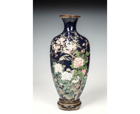 A Japanese cloisonn&eacute; silver wired vase Meiji period, of four sided baluster form, tapering to a circular foot, the dar