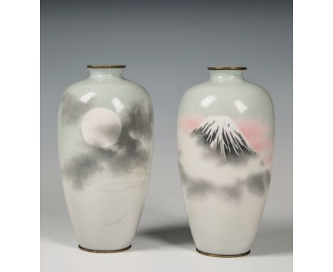 A pair of Japanese musen wireless cloisonn&eacute; vases Meiji period, of slender ovoid form, with shaded pale grey grounds, 