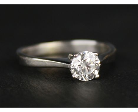 An 18ct white gold and diamond solitaire engagement ring the round brilliant cut diamond of good cut, clarity and colour, app