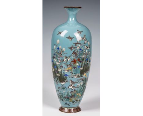 A light blue ground silver wired Japanese cloisonn&eacute; vase Meiji period, of slender void form, with fine silver wire dec