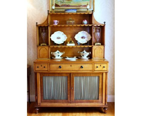 A fine 19th century satinwood secretaire cabinet the open back with three central open shelves, flanked by single tall open s