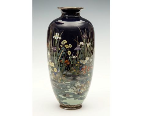 A silver wired dark blue ground Japanese cloisonn&eacute; vase Meiji period, of slender form with short everted neck, decorat