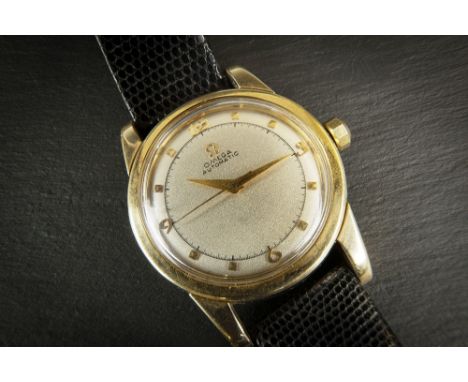 An Omega automatic wrist watch 1950s, silvered dial signed 'Omega Automatic', with gilt sword hands with sweep seconds, gilt 