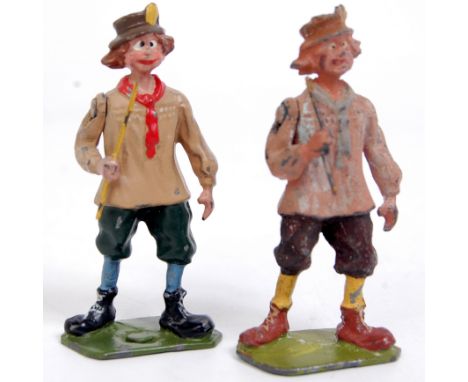 Britains, 587 village idiot in pinkish smock/blue scarf, paint somewhat faded (F); sold with another which may have some rest