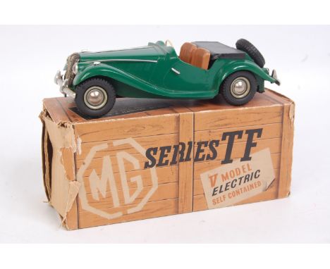 Victory Industries 1/18th scale MG TF, British Racing green example with brown interior, windscreen missing, in the original 