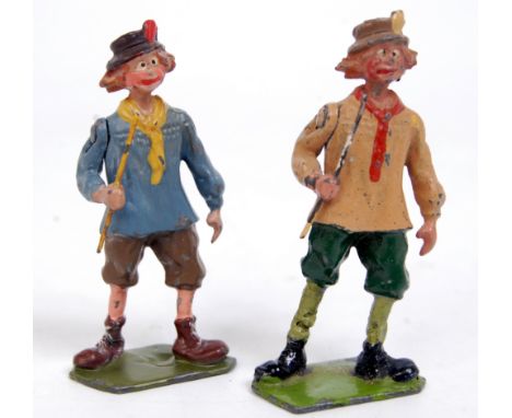 Britains, 587 village idiot in blue smock / yellow scarf, minor paint losses and base deemed off (VG); sold with another with