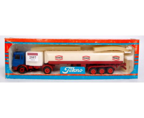 Tekno 1/50th scale diecast model of a MAN Diesel Texaco Tanker, blue cab with red chassis, with red and white tanker trailer,