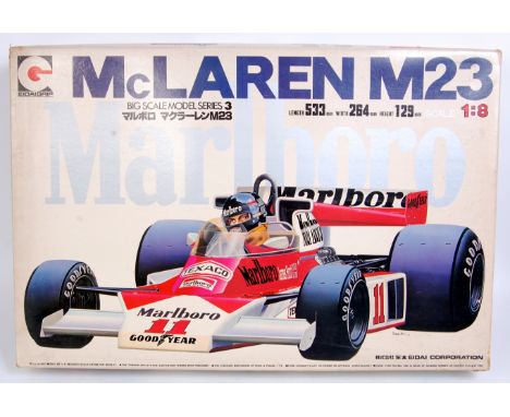 Eidai Grip, 1/8th scale plastic kit for a McLaren M23 F1 racing car, appears as issued, unmade example with transfers, conten