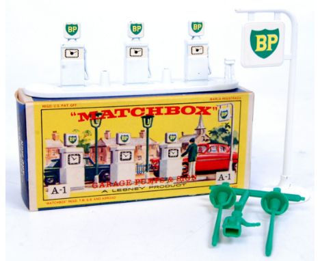 Matchbox Accessory Pack No.A1 "BP" Petrol Pumps and Sign, white with green, accessories attached to sprue, in the original Le