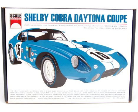 Scale Motorsport 1/24th scale white metal and resin kit for a Shelby Cobra Daytona Coupe, appears as issued in the original b