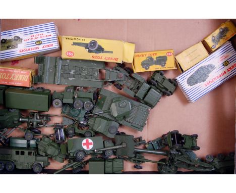 Mixed playworn and part boxed military Dinky Toys, Britains, Matchbox vehicles and accessories, all boxes are incomplete with