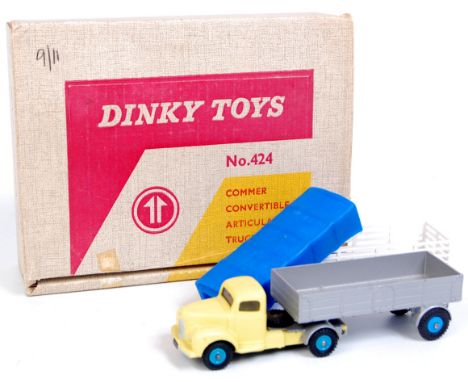 Dinky No.424 Commer Convertible Articulated Truck, comprising of light yellow cab, with windows, silver back with bleu hubs, 