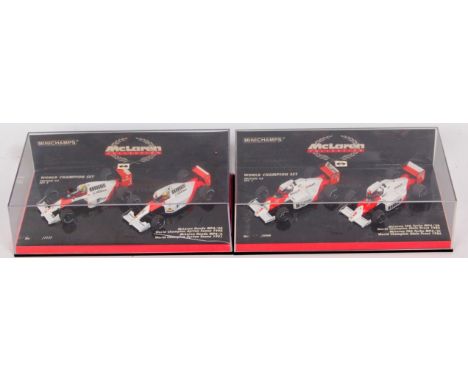 Minichamps 1/43rd scale World Champion Set Group, 2 Plastic cased Mclaren Examples from Edition 43, set numbers to include No