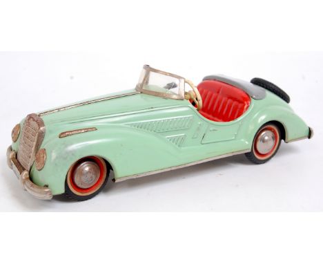 Distler Mercedes Benz Open Top Sports Car, light green body, red seat with red and white walled wheels with steel hub cap, cl