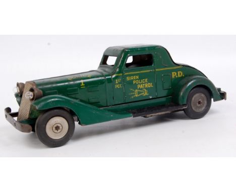 Marx Toys (USA) siren Police Patrol Car, large scale pressed steel friction drive example, fitted with motor, siren and wired