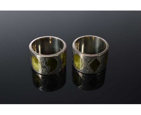A pair of nice Edwardian silver and hardstone inlaid napkin rings by H.G & S, some minor dents and scratches but otherwise go