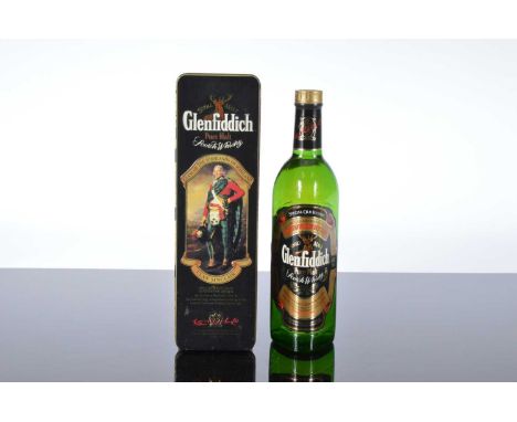 A bottle of Glenfiddich Special Old Reserve Pure Maly Scotch Whisky in a Clan Sinclair tin box