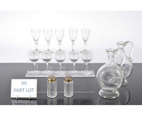 A set of four Edwardian glass moon flask decanters and a suite of small liquor glasses, together with a pair of cut glass pot
