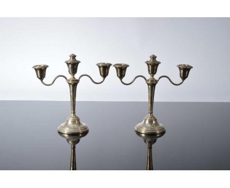 A pair of 1960s silver filled short table candelabra from Adie Bros, 21cm high (2+)
