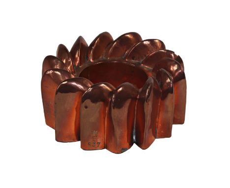 A Victorian copper ring shaped jelly mould, by Benham & Froud 537, formed from overlapping arch top panels, stamped makers ma