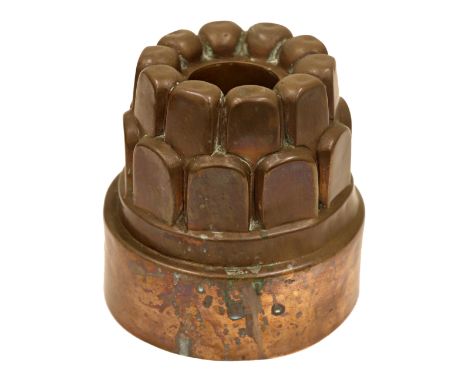 A Victorian copper circular tiered jelly mould, by Benham & Froud, no. 410, with two rows of flattened arch top panels, plain