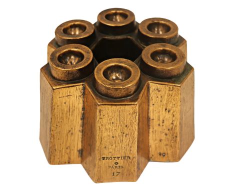 A 19th century French copper jelly mould by Trottier Paris, no. 17, composed of six slant sided sections, with ring moulded t