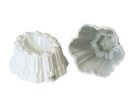 Two glazed ceramic jelly moulds, by Shelley 'The Savoy', another 'The Star', printed marks, 7cm x 11cm & 11.5cm x 12cm (2).