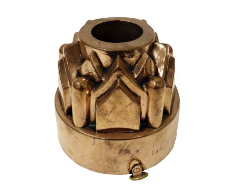 A Victorian copper circular tiered copper jelly mould, 244, composed of overlapping pointed arch panels interspaced with fing