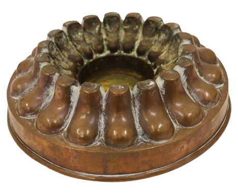 A Victorian copper circular pedestal border jelly mould, with ring of lobed panels, plain circular base, unmarked, 7cm high, 