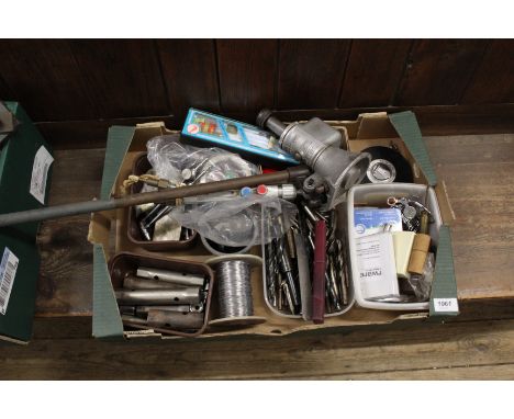 A box of metal working tools including drill bits etc