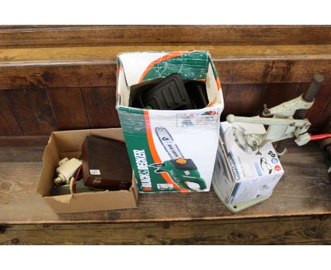 A drill press stand with sonic cleaner, Black &amp; Decker chainsaw and pneumatic drill etc