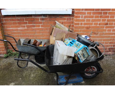 A quantity of mixed tools and two wheel barrows