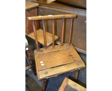 A country stick back child's chair